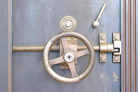 Close-up of vintage vault door.